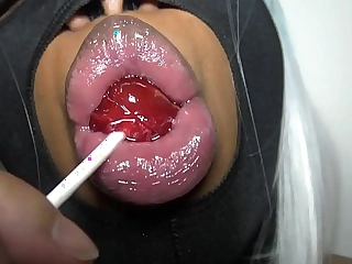 This is dslaf- dominican lipz asmr lollipop sucking with unearth sucking lips